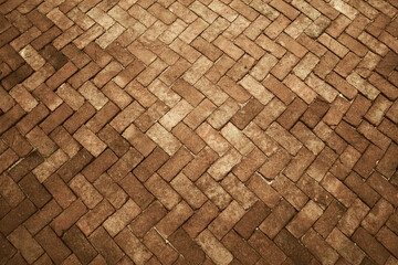 Ancient dark and light clay tone brick floor pavement stones luxury wall