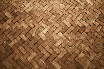 Ancient dark and light clay tone brick floor pavement stones luxury wall