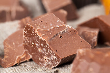 broken into pieces and crumbs milk chocolate
