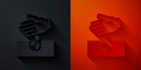 Paper cut Seeds of a specific plant icon isolated on black and red background. Paper art style. Vector