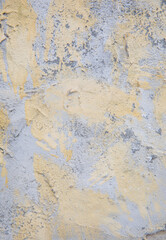 Old yellow gray surface. Cement wall with coarse texture. Decorative vintage background.