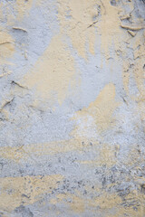 Old yellow gray surface. Cement wall with coarse texture. Decorative vintage background.