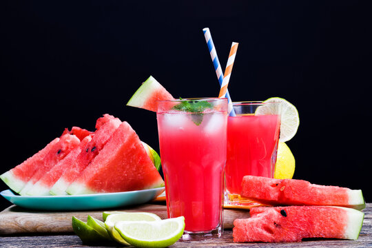 Watermelon Juice Poured Into A Glass Container