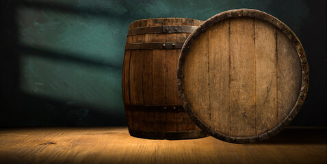A wine cellar full of barrels of wine