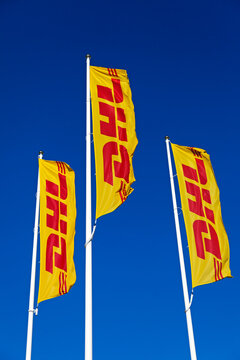 Umea, Norrland Sweden - March 19, 2021: three flags with a well-known transport company logo