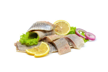 Atlantic salted herring fillet with onion ring,lemon, and pepper, isolated on a white background