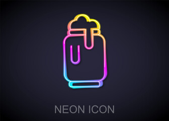 Glowing neon line Beer can with foam icon isolated on black background. Vector