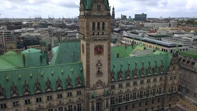 flying around the town hall of hamburg germany, circeling