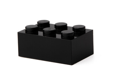 Colored plastic toy building block isolated on white