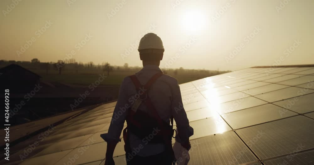 Wall mural maintenance assistance technical worker in uniform is smiling satisfied of his work after checking o
