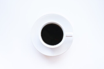 Flat lay of hot americano coffee in white coffee cup on white background