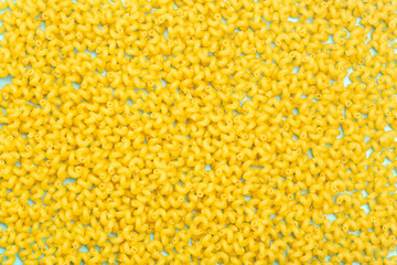 Pasta background. Raw Italian vermicelli spiral pasta. Food background.