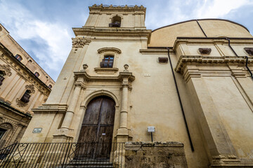 Frontage of Church of St Clare of Assisi in historic part of Noto city, Sicily in Italy
