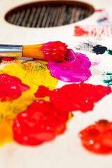 Obraz premium mixed on a wooden palette of multi-colored paints