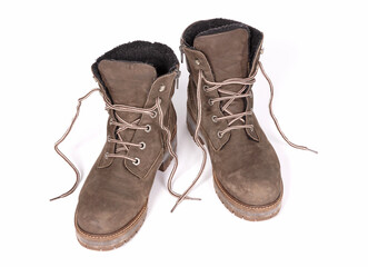 Green boots isolated on white background