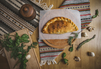 Traditional Georgian adjara khachapuri and Kolkh khachapuri on the table. Homemade baking. Top view. Flat lay