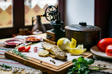 Baked fish seabass with fish spices and salad. Seafood in restaurant. Top view. Healthy eating