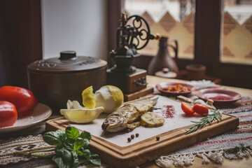 Baked fish seabass with fish spices and salad. Seafood in restaurant. Top view. Healthy eating