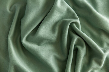 wrinkled surface of soft khaki fleece, background, texture