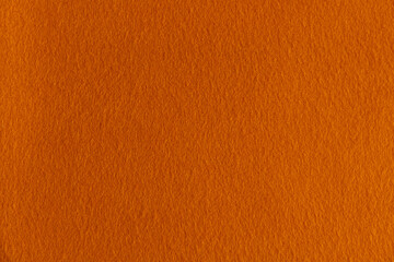 smooth surface of soft orange fleece, background, texture