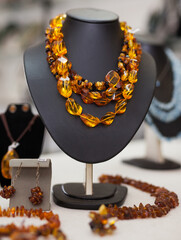 Counter with amber jewelry in store