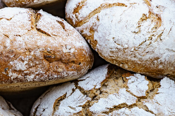Many rustic fresh bread loaves