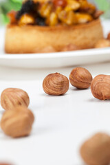 small round tartlet with a variety of fillings