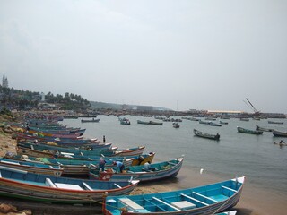 Fototapeta na wymiar boats in the Harbor, Vizhinjam fishing harbor Thiruvananthapuram Kerala
