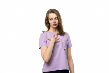 Fototapeta premium girl feeling confused, puzzled and insecure, pointing to self wondering and asking who, me