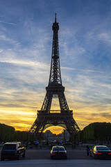 Eiffel tower silhouetted against a beautiful sunset sky.