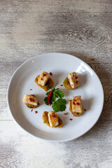 tapas de España, merluza de azafrán. tapas from Spain, saffron hake.