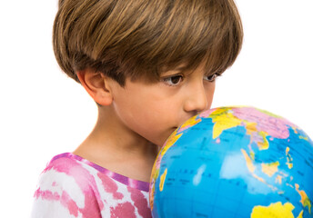 Child Hugging And Kissing A Balloon. Education. Earth