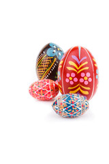 Easter egg decor on isolated on white background. Nest with handmade painted eggs pattern.