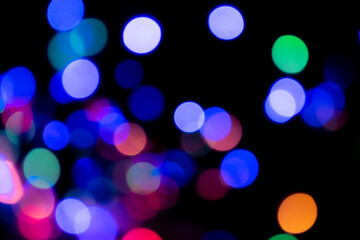 Colorful bokeh lights festive background
