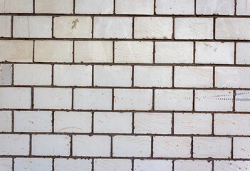 Corrugated sheet metal, badly painted with gray paint for background. Metal corrugated roofing sheet.Painting of metal surfaces for rust control Abstract background for sites and layouts. Iron fence