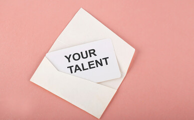 Word Writing Text YOUR TALENT on card on the pink background