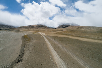 Aerial photo of gravel road in the wilderness of Tibet