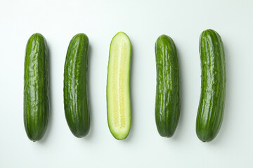 Group of ripe cucumbers on white background