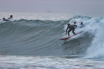 Surfing winter swells at Rincon point in California