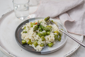 Spring food; Delicious risotto with asparagus and wild garlic