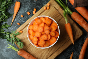 Concept of fresh vegetable with carrot on black smokey table