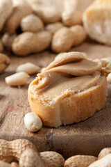 ingredients for preparing a quick Breakfast of bread and peanuts