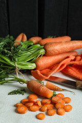 Concept of fresh vegetable with carrot on white textured table
