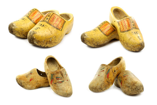 Traditional Dutch decorated wooden shoes on a white background