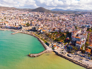 Picturesque panorama of Turkish coastal city of Kusadasi on bank of Aegean Sea on sunny day