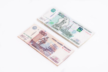 Several bills of one thousand and five hundred rubles of the Russian Federation isolated on white background