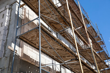 building a new home on the building scaffolding