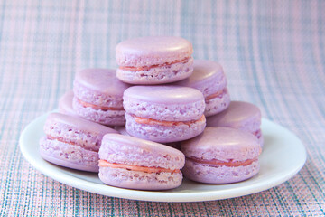 tasty fresh delicious macaroons on  plate