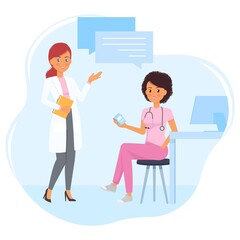 Medical consultation between female doctor and nurse