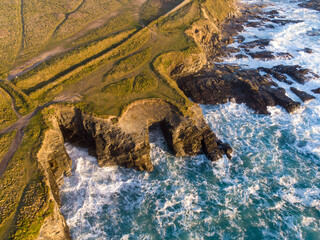 Godrevy to gwithian aerial drone of the sea and coast at sunset 